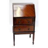 A small mahogany bureau, the fall-front enclosing leather writing surface and fitted interior