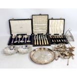 A group of variously hallmarked silver flatware including teaspoons, sugar sifter, single fork, five