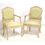 A pair of French Louis XV style painted fautiles (2).