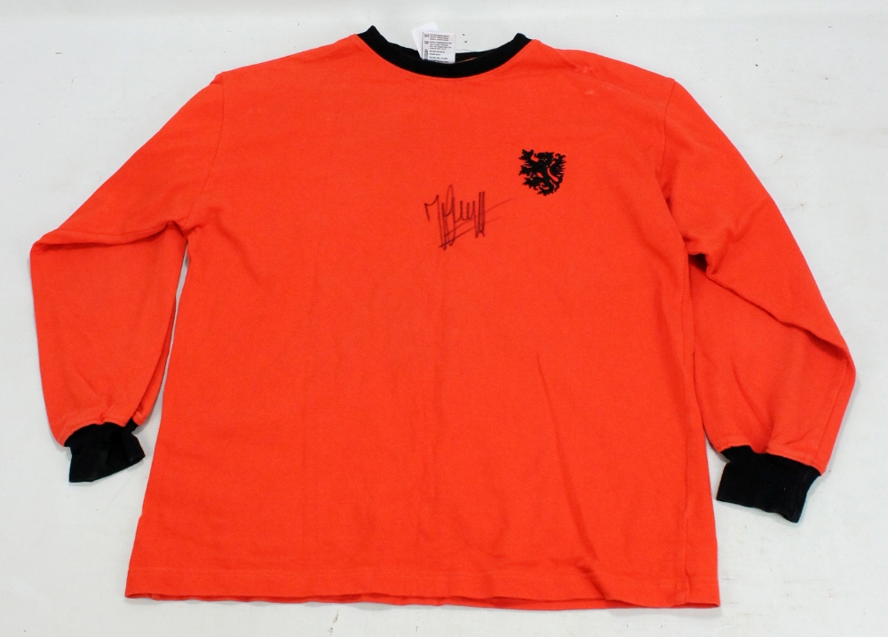 JOHAN CRUYFF; a signed replica 1960s Netherlands football shirt.