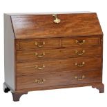 A substantial George III mahogany bureau, the full front enclosing fitted interior, above two