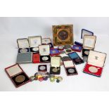 A large collection of commemorative medallions with some relating to the Royal Family, also a