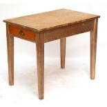 A pine rectangular side table with single end drawer and square sectioned tapering legs.