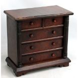 A mahogany table top chest of two short over three long drawers, 29 x 30cm.Additional