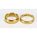 Two 22ct yellow gold D-shaped wedding bands, size K1/2 and N1/2, approx 13.5g (2).