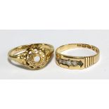 An 18ct yellow gold ring and a yellow metal ring stamped '18ct Plat', both set with white stones,