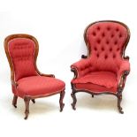 A Victorian mahogany spoon back gentleman's armchair raised on cabriole front supports to castors