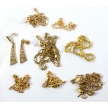 A group of 9ct yellow gold bracelets including charm bracelet suspending unmarked yellow metal