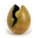 MARY CALDER (20th century); turned sycamore sculpture modelled as a broken egg, with stained
