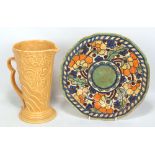 CHARLOTTE RHEAD FOR CROWN DEVON; a 'Byzantine' pattern tubeline decorated shaped circular plate,