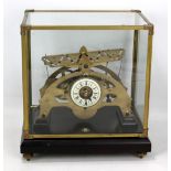 A brass Congreve rolling ball clock, the chapter ring set with Roman numerals and with painted