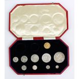 A 1902 specimen coin set, part fitted including associated 1906 sovereign.
