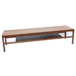 A mid-20th century teak coffee table with undertier, length 168cm.Additional InformationThere is