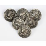 ABLE & CHARNELL; a cased matched set of six Edward VII hallmarked silver Art Nouveau buttons, each