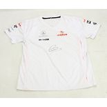 LEWIS HAMILTON; a signed replica McLaren-Mercedes shirt.