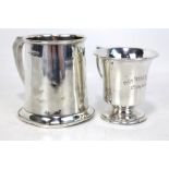 CRISFORD & NORRIS; a George VI hallmarked silver christening mug of tapering form, with angled