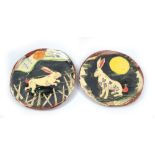 BEN FOSKER (born 1960); a pair of slip decorated earthenware plates depicting rabbits, maximum