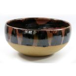 RAY FINCH (1914-2012) for Winchcombe Pottery; a large stoneware rose bowl, tenmoku and saturated