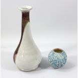 JONATHAN HANCOCK (born 1955) for Steam Pottery; a long-necked stoneware vase, sang de boeuf over