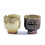 JIM MALONE (born 1946); two stoneware yunomi, one with tenmoku glaze, one with granite glaze,