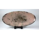 GABRIELE KOCH (born 1948); a large oval earthenware dish, burnished and smoke-fired, incised mark,