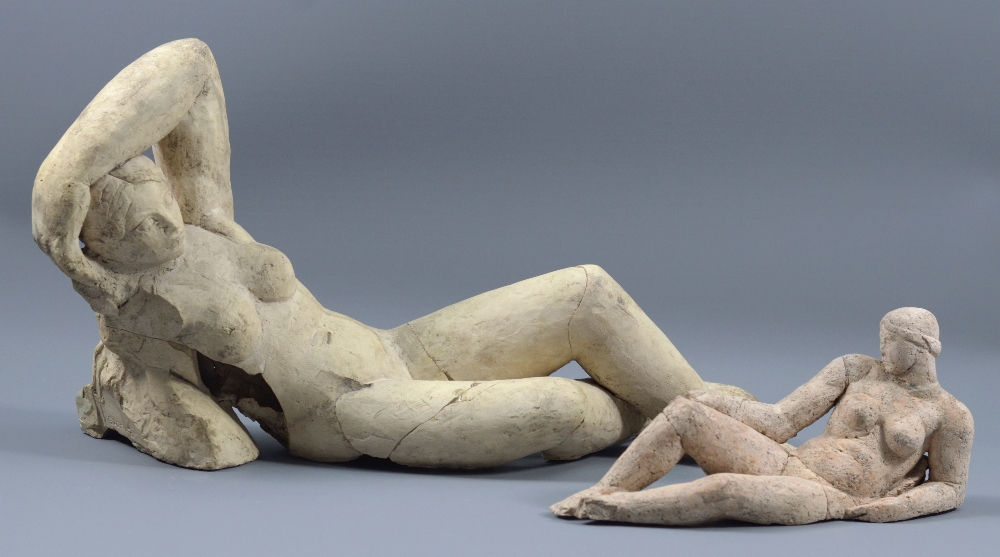 JOHN STORRS (1885-1956); a stoneware sculpture of a reclining female nude, impressed name, length