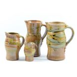 JANE HAMLYN (born 1940); four salt-glazed jugs, impressed JH marks, tallest height 22cm (4). (D)