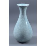 POH CHAP YEAP (1927-2007); a porcelain vase covered in pale celadon crackle glaze, incised