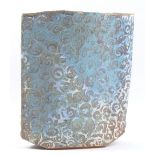PETER BEARD (born 1951); an early stoneware slab vase covered in turquoise glaze with spiral