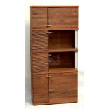 VENJAKOB; a Colorado walnut 'Xenia' display cabinet, the facade made up of eight cupboard doors of