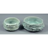 ALEX SHIMWELL (born 1980); two heavily textured porcelain bowls covered in celadon glaze,