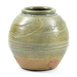 JIM MALONE (born 1946); a stoneware globular vase partially covered in green ash glaze with