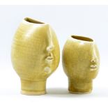 PAT HIGGINBOTHAM (1928-2010); two oval porcelain face vases covered in a pale green crackle glaze,
