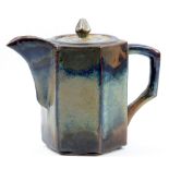 ABDO NAGI (1941-2001); a hexagonal stoneware teapot covered in mottled blue and khaki glaze,
