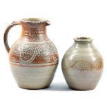 RAY FINCH (1914-2012) for Winchcombe Pottery; a salt-glazed jug and vase, incised meander