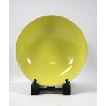 RUPERT SPIRA (born 1960); a stoneware bowl covered in bright yellow glaze, impressed RS mark, made