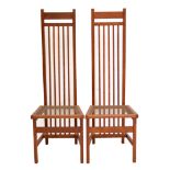 RICHARD LA TROBE-BATEMAN (born 1938); a pair of oak high backed side chairs with full length