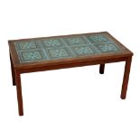 TRIOH; a tile top coffee table, 90 x 49cm (af).Additional InformationSurface damage.