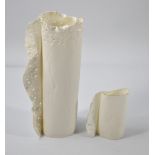 JOY TRPKOVIC (born 1950); two translucent porcelain cylinder vases with perforated wings, painted JT