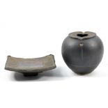 PHIL MUMFORD (born 1945); a stoneware vase with flat incised rim covered in bronze glaze,