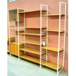 LADDERAX; a teak wall unit comprising four ladders, glazed sliding door cabinet, solid sliding
