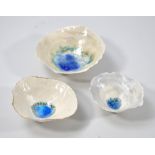 JOY TRPKOVIC (born 1950); three small semi translucent porcelain pinch bowls, carved exteriors and