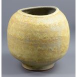CHRIS CARTER (born 1945); a large stoneware vessel covered in textured and heavily pitted mustard