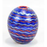 NORMAN STUART CLARKE; a small ovoid 'Ebb Tide' pattern iridescent glass vase with spiralled orange