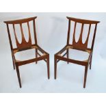 G-PLAN; a set of four 'Brasilia' teak chairs (lacking seats) (4).