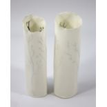 JOY TRPKOVIC (born 1950); a pair of translucent porcelain cylinder vases decorated with branches and