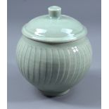 DAVID LEACH (1911-2005) for Lowerdown Pottery; a fluted porcelain jar and cover, green celadon