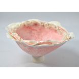 JOY TRPKOVIC (born 1950); a semi translucent porcelain pedestal bowl with petal rim, carved exterior