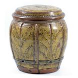 MIKE DODD (born 1943); a stoneware jar and cover, applied and incised decoration covered in green