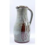 MARK GRIFFITHS (born 1956); a stoneware jug decorated with grasses, height 34cm.Additional